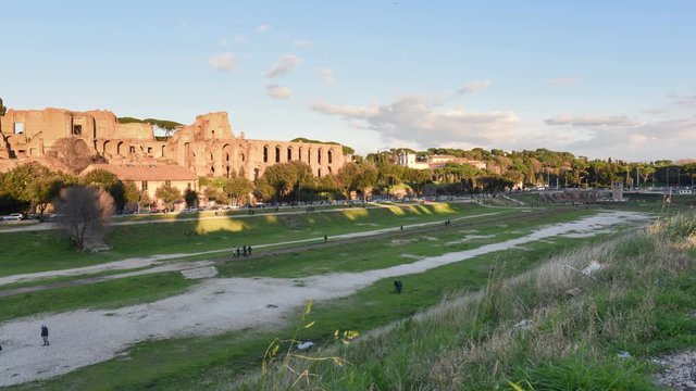 Rome, Italy, timelapse of Palatin hill with ancient palace complex ruins and Circus Maximus in a scenic sunset large view
