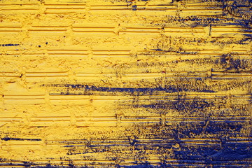 Black-yellow wall from bricks for background.