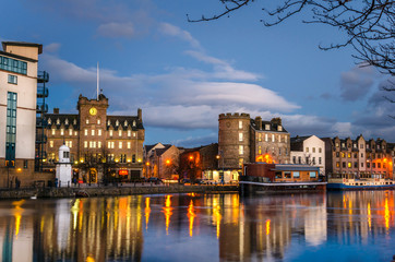 Obraz premium Historic Buildings on the Old Leith Harbour at Dusk. Edinburgh, Scotland