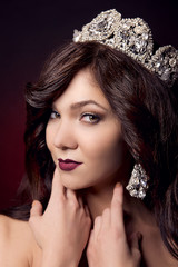 Beautiful girl with a tiara on her head
