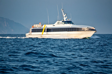 Fototapeta na wymiar Ferryboat between Ibiza and Formentera. Mediterranean transportation. Tourist traffic on Balearic Islands.
