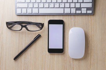 Office desk wood with computer, note book,phone concept in wood background.Copy space.