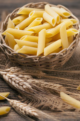 Dried penne pasta background
