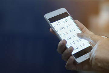 student testing in exercise, exams answer on a tablet with multiple-choice questions by finger...