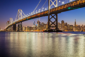 Fototapeta na wymiar San Francisco skyline with Oakland Bay Bridge at night, California, USA