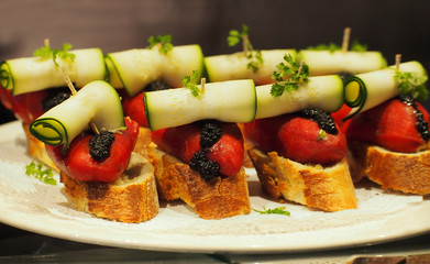 Spanish breakfast. Toasts with pepper and cucumber