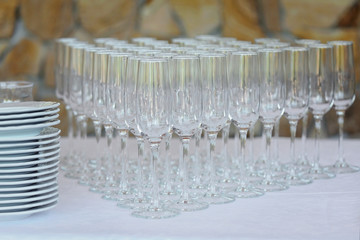 Many empty glasses on a table, closeup