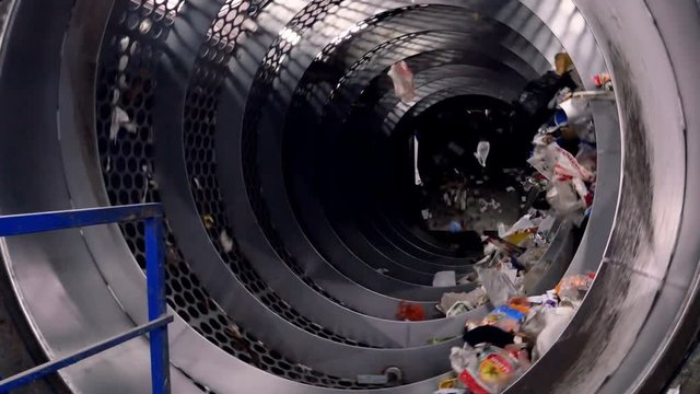 Trash sorting machine working at a trash recycling plant. HD.