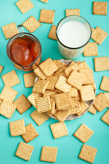tasty breakfast crackers with jam and milk