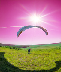 Air paragliding under the Sun