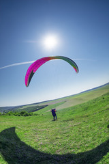 Air paragliding under the Sun