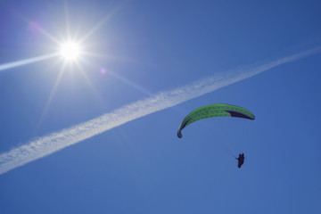 Air paragliding under the Sun