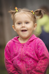 Children in the village walk in the tall grass