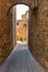 Wall murals Narrow Alley Beautiful narrow alley with traditional historic houses at Pienza city