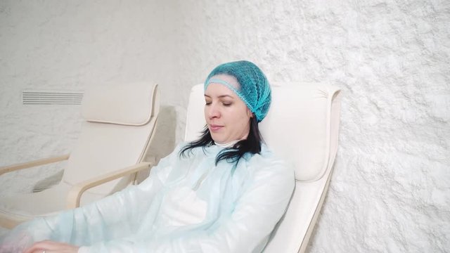 Woman relaxing in a salt cave