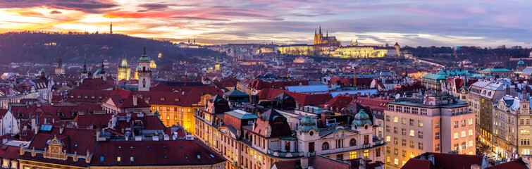 Most mystical and mysterious city in Europe. Prague through the eyes of birds with magnificent sunset and sky over the traditional houses with red roofs. Old town square, Prague, Czech Republic