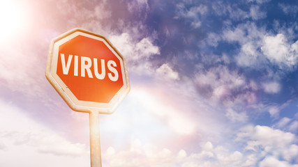 Virus on red traffic road stop sign