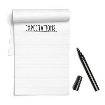 Expectations on note book with black pen