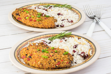 Baked tortilla crusted tilapia with cranberry rice.