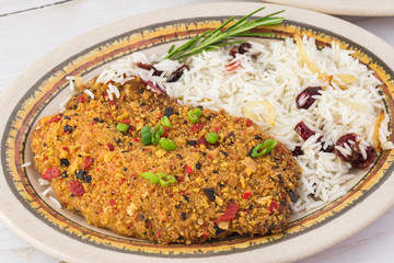 Baked tortilla crusted tilapia with cranberry rice.