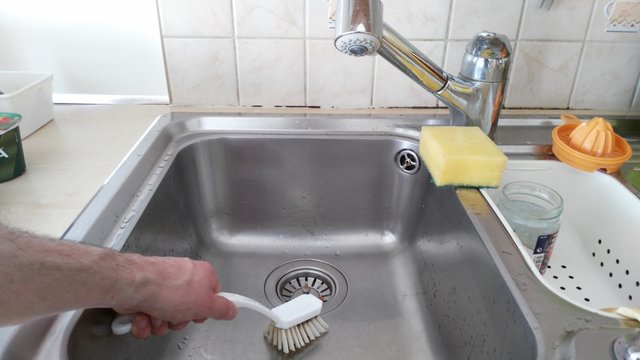 Cleaning a sink