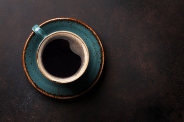 Coffee cup on old kitchen table