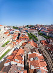 Fototapeta na wymiar View of Alfama and Square D. Pedro 4, the old neighborhood of Lisbon, from the Santa Justa Lift