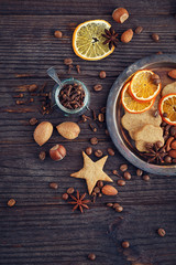 Homemade gingerbread cookies, spices and decorations