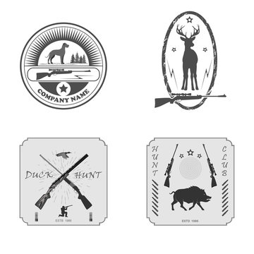 
A set of four labels. two sniper rifles. in the middle of a deer with antlers. a dog and a duck. is running wild boar.
totally vector illustration.
