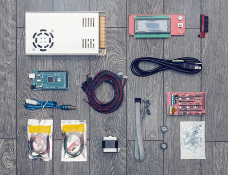Flat lay of electronic and mechanical parts and components of DIY device