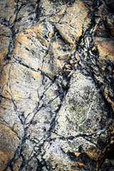 detail in dark orange colored rock