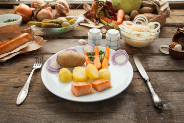 Organic lunch with smoked salmon and boiled potato.