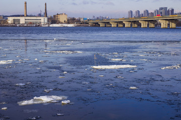 a piece of ice in the river in winter