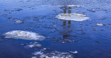 a piece of ice in the river in winter
