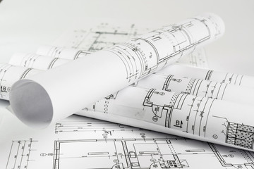Architect rolls and house plans, close up