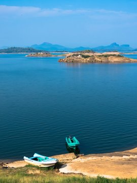 Beautiful Lake Landscape with boats in Senanayake Samudraya Galoya National Park Inginiyagala, Ampara, Sri Lanka