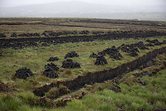 Peat bog with blocks dug out, Bloody Foreland, County Donegal, Ireland, June 2009
