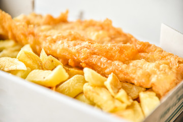 Fish and chips in  take away box - obrazy, fototapety, plakaty