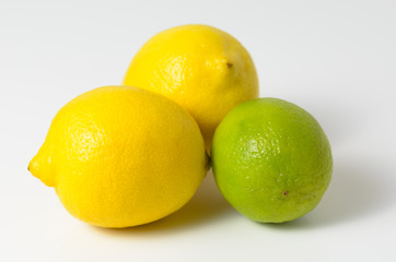 Lemons and limes on a white background.