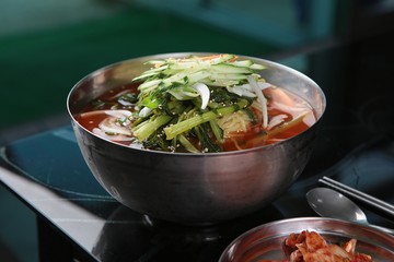  yeolmu kimchi guksu. Noodles in Young Summer Radish Kimchi Broth 