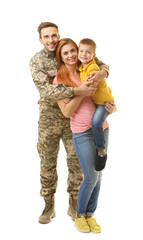 Soldier reunited with family on white background