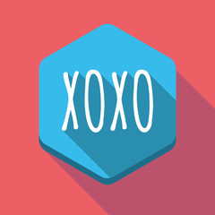 Long shadow hexagon with    the text XOXO