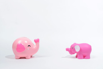 Pink elephant toy isolated on white background.