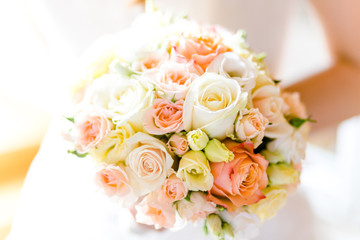  White and apricot wedding bouquet with roses