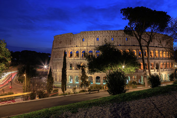 Fototapeta na wymiar Night view of Colosseum in Rome. Rome architecture and landmark. Colosseum is one of the main attractions of Rome and Italy