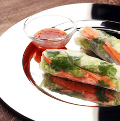 Vietnamese Salad spring roll, summer roll with vegetables, lettuce and rice noodles