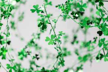 St. Patrick's day 3 leaf-clover wire garland background.