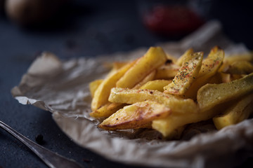 French fries on dark background