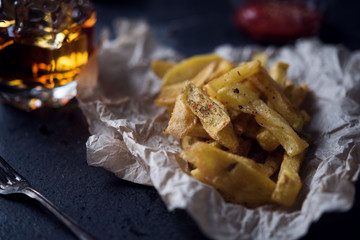 French fries on dark background