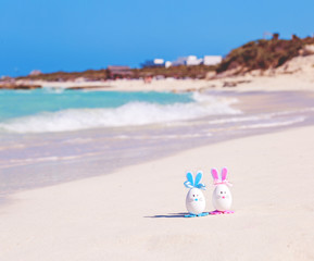 Easter, Easter eggs on the beach, ocean, sea